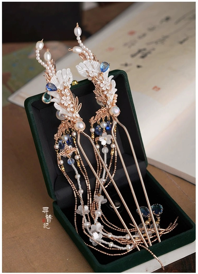 Sapphire Tears Chinese Hanfu tassel hair pin set arranged in a green velvet jewelry box with blue crystals white flowers and pearls