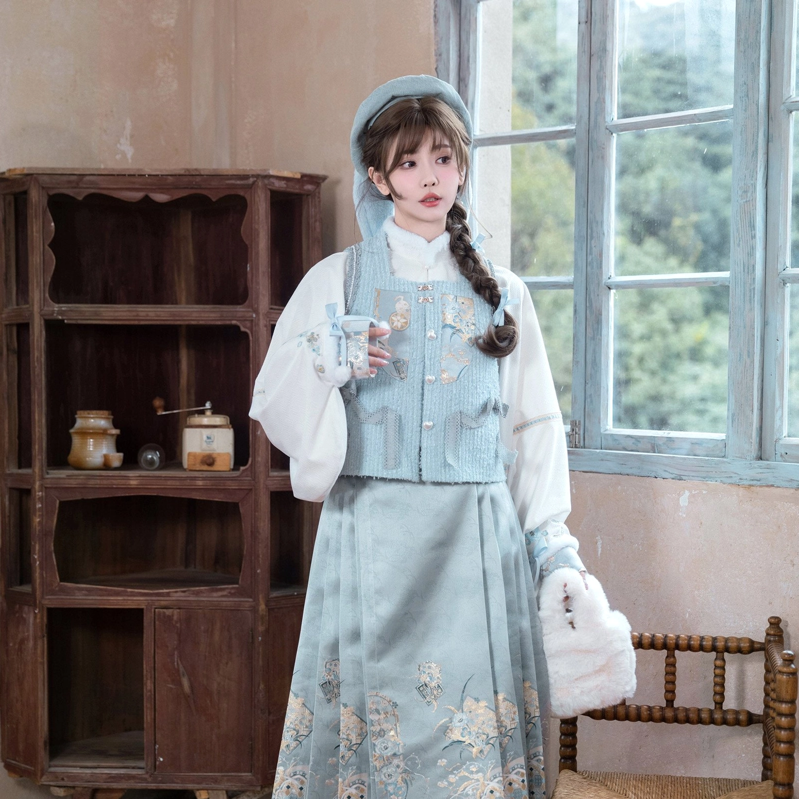 Full front view of Sea Salt Cream modern Ming Hanfu bijia and mamianqun set in a vintage indoor setting