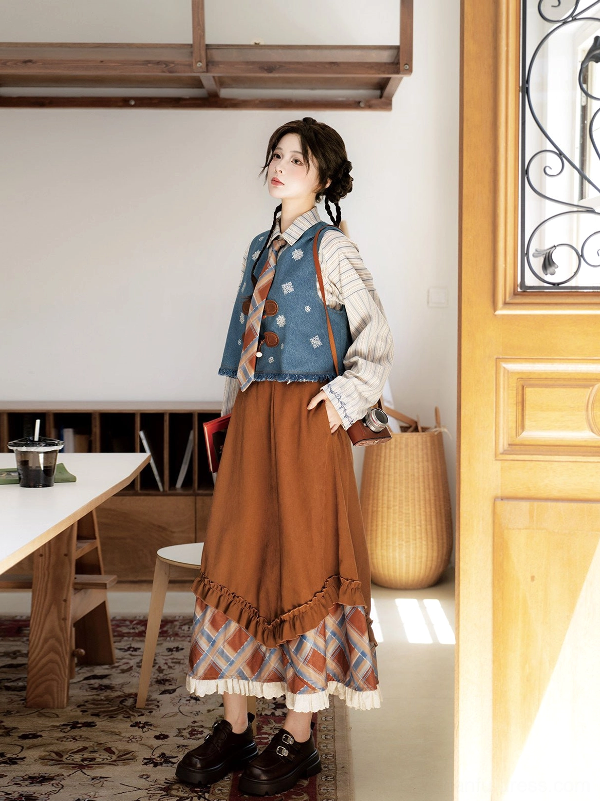 Sea Salt Mocha modern hanfu vintage academia layered outfit side view with striped long sleeve top embroidered vest and ruffled brown skirt