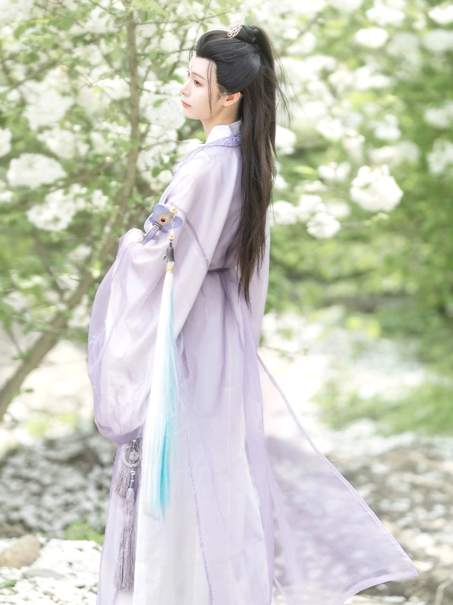 Purple Tang Dynasty inspired Shan Hai Jing Hanfu robe with layered flowing train blue tassel waist accent and embroidery