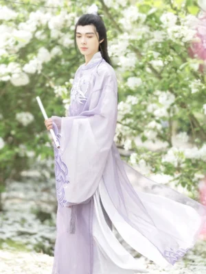 Purple Shan Hai Jing Tang Dynasty round collar Hanfu robe for men shown in a flower garden with embroidered chest and sleeve details