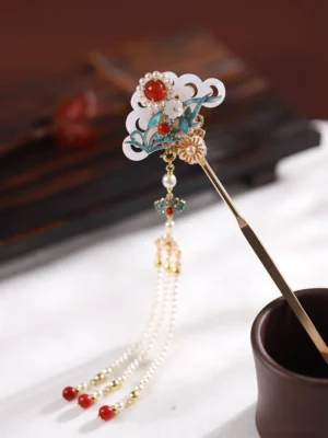 Shaohua Chinese hair stick with gold-tone cloud ornament, blue and white cloisonne-style details, pearl accents, red bead tassels, and traditional Hanfu styling