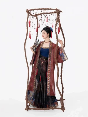 Three-quarter side view of the layered Shen Nuo Hanfu set showing the flowing overcoat, pleated brocade mamianqun skirt, and Nuo mask styling