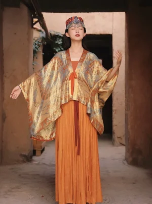 Front full-body view of a woman wearing a shimmery lotus Modern Tang Dynasty beizi Hanfu coat with oversized batwing sleeves and burnt-orange tie closure