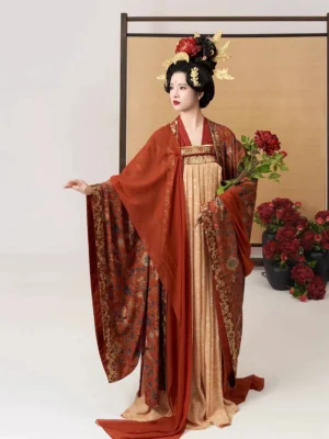 Three-quarter side view of the Shuangfengque Tang Dynasty Hanfu set showing flowing floor-length sleeves, long skirt train, warm vintage colors, Tang hairstyle, and red peony bouquet