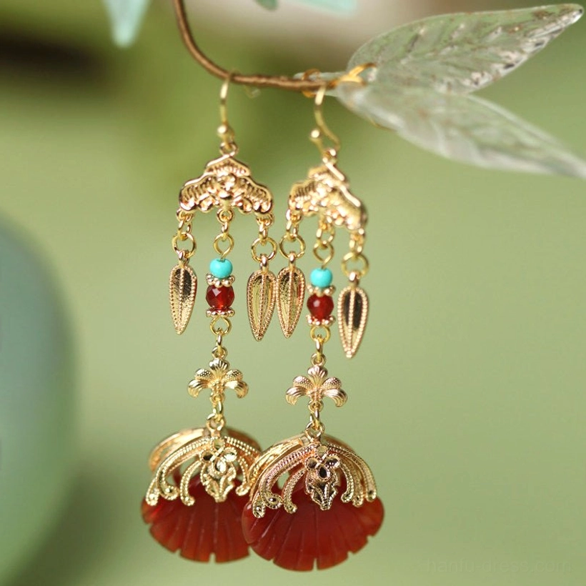 Front close-up of gold filigree Chinese Hanfu hook earrings featuring red fan-shaped pendants and layered turquoise bead tassels