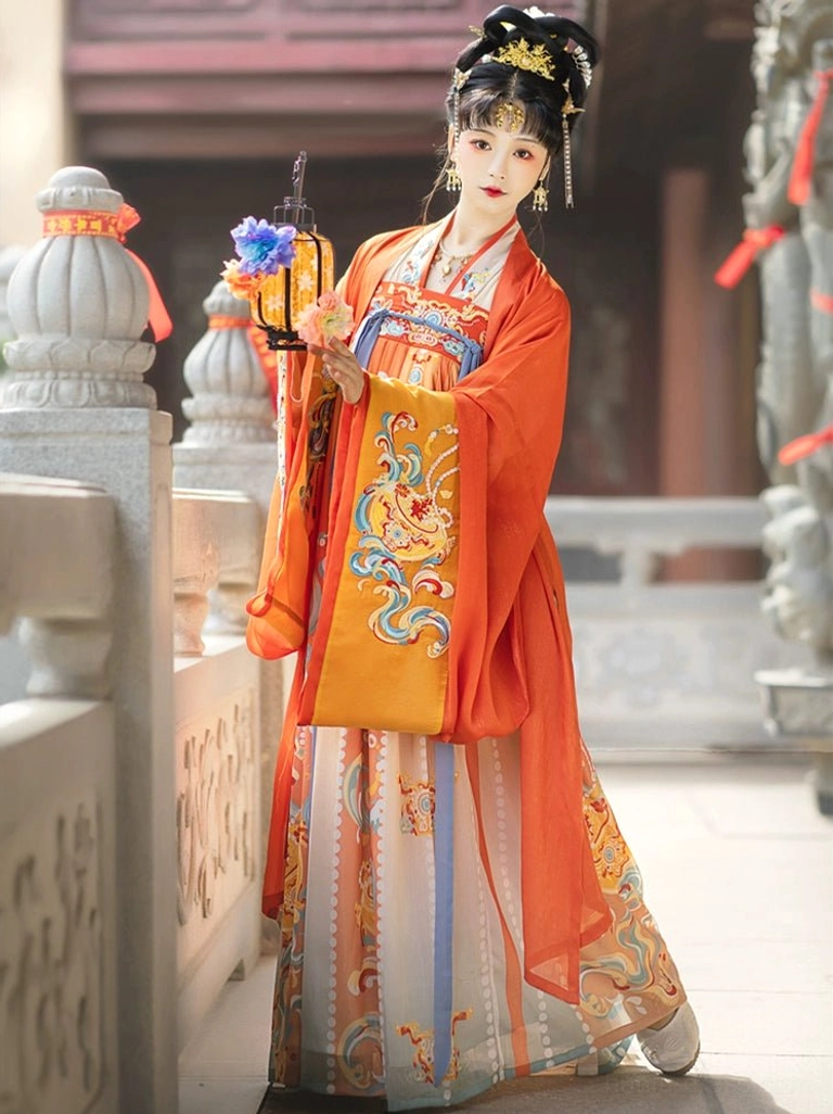Side view of a Tang Dynasty Qixiong Ruqun Hanfu costume showing traditional Chinese skirt prints, terracotta orange outer robe, flowing sleeves, and vintage floral lantern