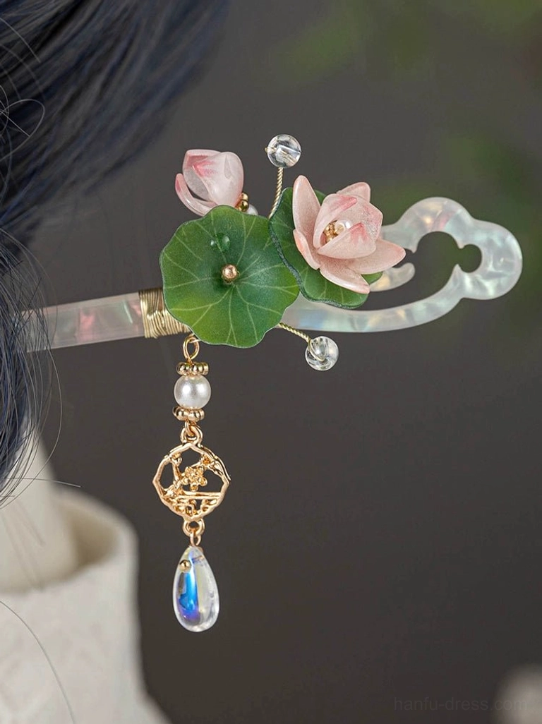 Side view of a traditional Chinese lotus hairpin styled in a coiled updo, demonstrating its elegant Hanfu hairstyle wearing effect