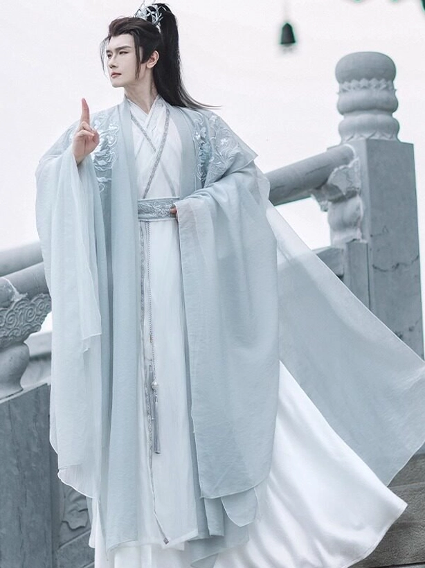Side view of Silver Scale men's xianxia hanfu costume showing floral shoulder embroidery waist tassel and long layered robe
