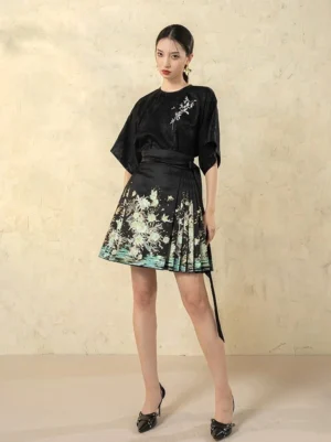 Front full-body view of Silver Sea modern Ming style mini mamian skirt with pleated ink landscape print and black embroidered Chinese-style top
