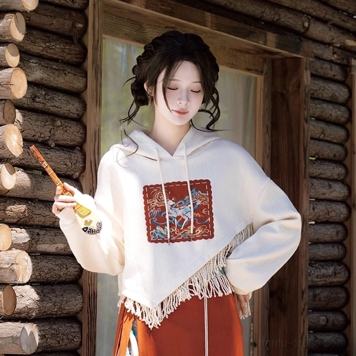 Upper-body view of the Singing Deer modern Hanfu hooded sweater showing the drawstring hood, soft knit texture, and vivid Dunhuang embroidery