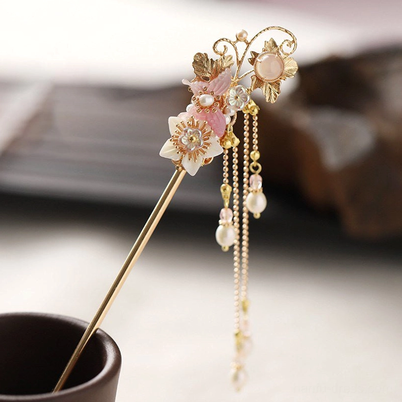 Single pink flower Chinese hair stick with gold-toned frame and layered pearl tassels for traditional updos