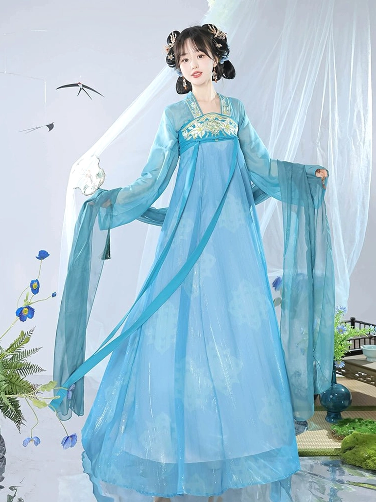 Sky blue Tang Dynasty Hanfu Qixiong Ruqun shown in a full front view with sheer chiffon layers, embroidered floral chest panel, and long flowing waist ribbons