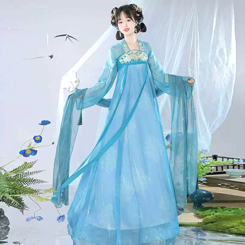 Sky blue Tang Dynasty style Qixiong Ruqun Hanfu shown in a mirrored full-body view with embroidered chest detail and flowing matching ribbons