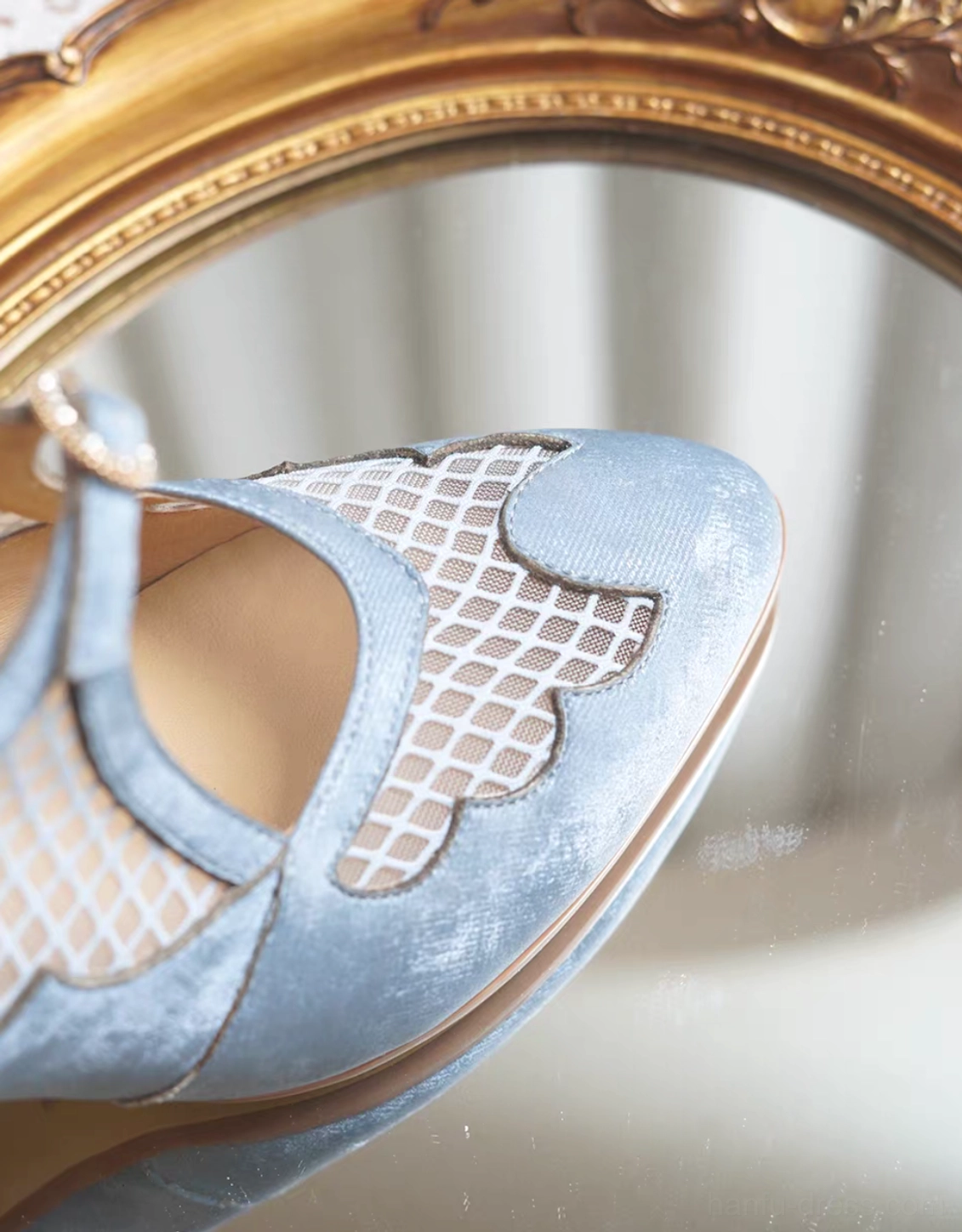 Close-up of sky blue vintage qipao Mary Jane heel showing the round buckle T-strap scalloped mesh vamp and low block heel