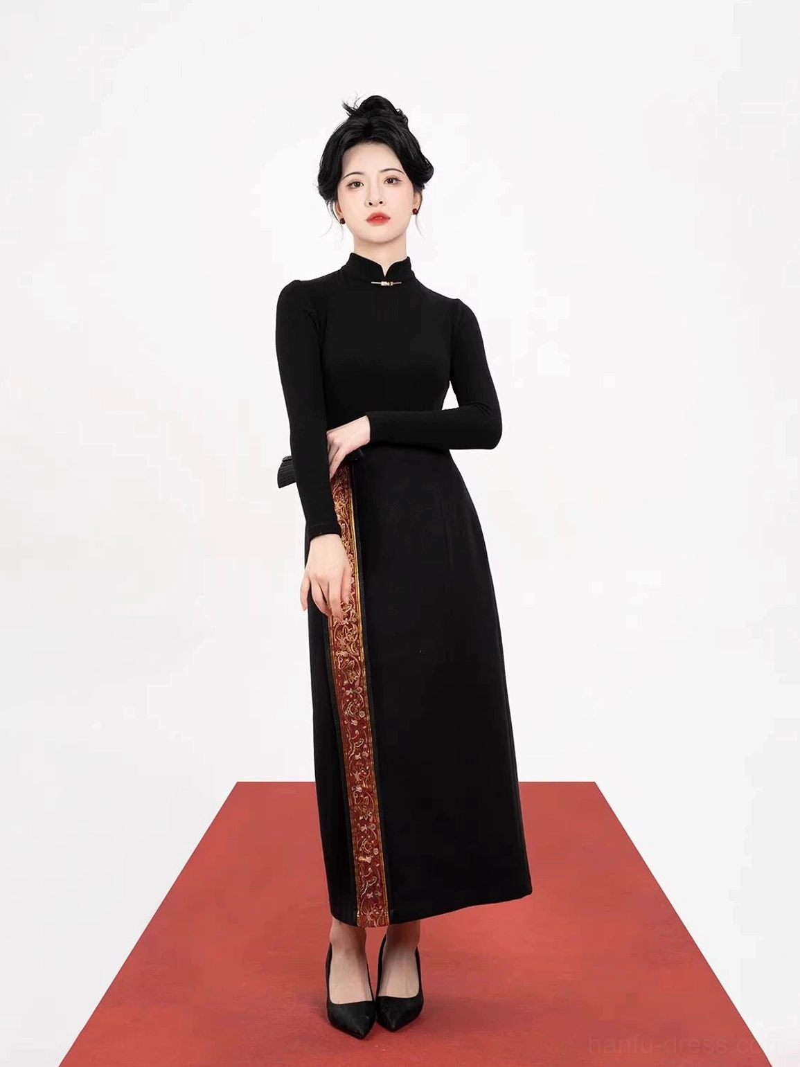 Side-front view of a slim black Mandarin-collar jacket and high-waisted Dunhuang embroidered skirt modern Tang Dynasty Hanfu outfit