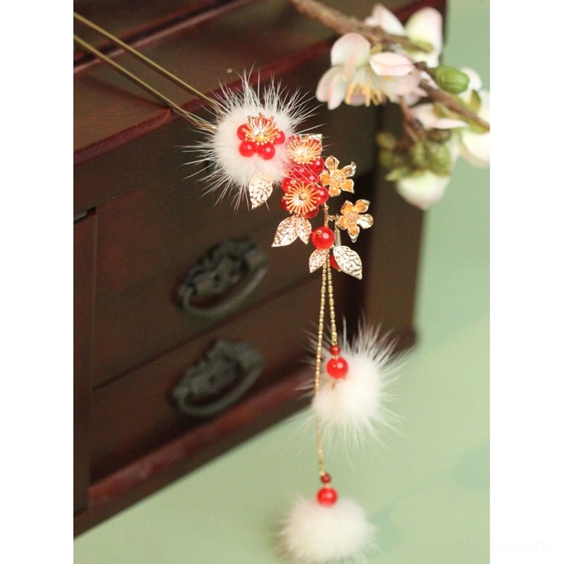 Small single tassel Chinese hair clip with gold floral ornaments, red bead flowers, white pom-pom details, and a long fur-tipped tassel