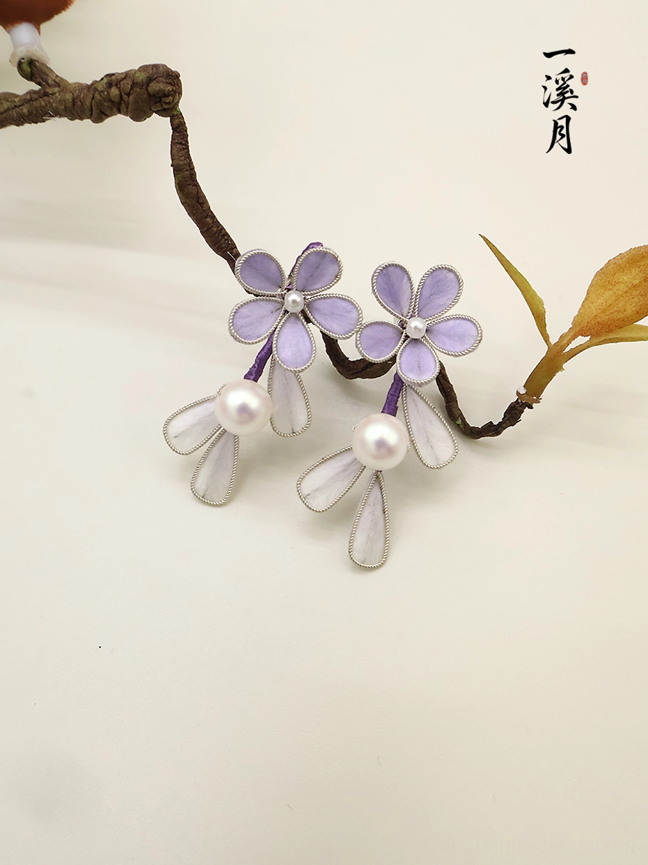 Smoke purple flower pearl drop Hanfu earrings displayed on a natural twig, featuring five petal floral details, silver edging, translucent white petal charms, and elegant Chinese jewelry styling