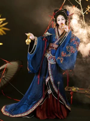 Front full-body view of a navy blue and wine red Han Dynasty Hanfu straight-hem robe with floral embroidery, wide sleeves, red waist ribbons, and a dramatic trailing hem