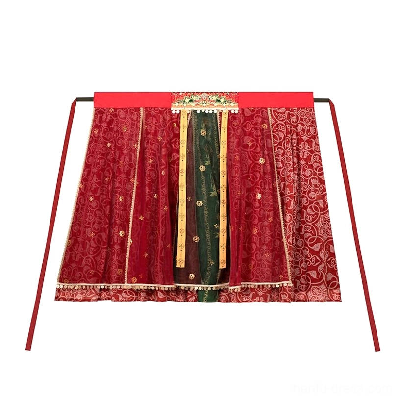 Red and green Dunhuang inspired Hanfu wrap dress with waist ties patterned hem and tassel decoration flat lay