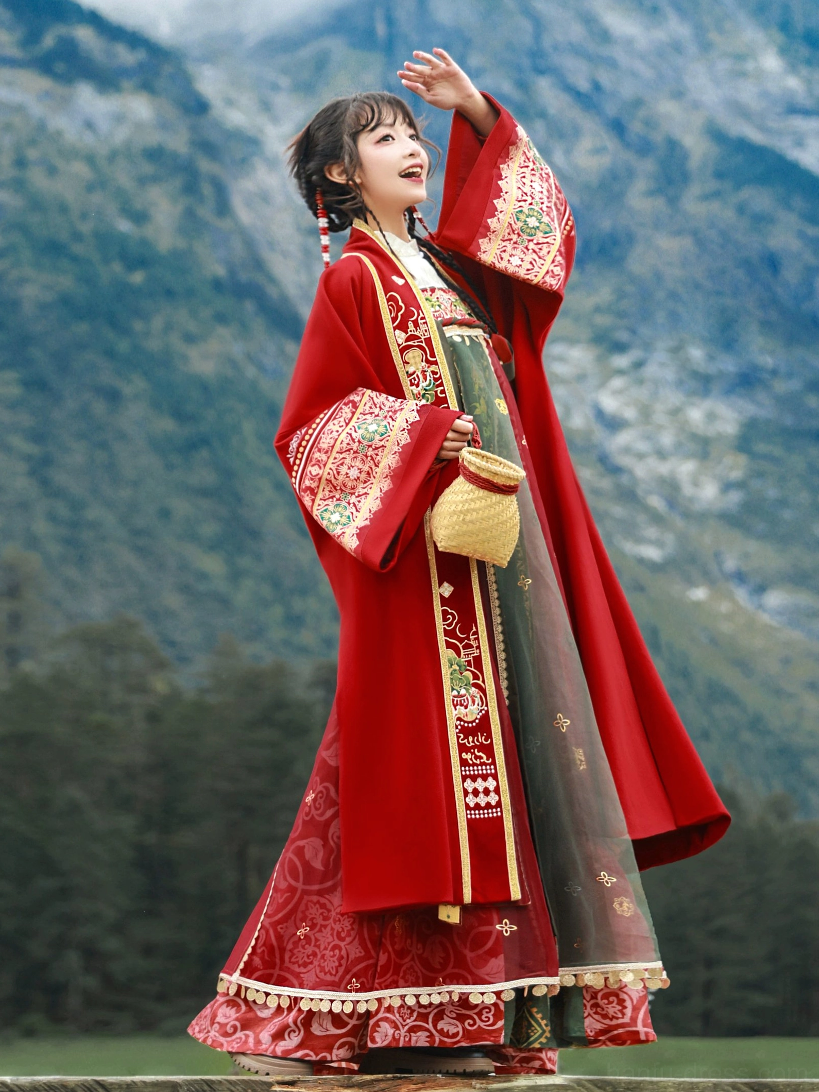 Full length modern Tang Dynasty Dunhuang Hanfu costume featuring red outer robe green skirt panels and decorative tassel hem