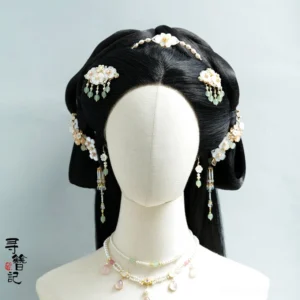 Traditional Chinese Hanfu hair jewelry styling with Snow Petals back hair pin shown on a braided black hairstyle alongside matching floral and pearl-inspired ornaments