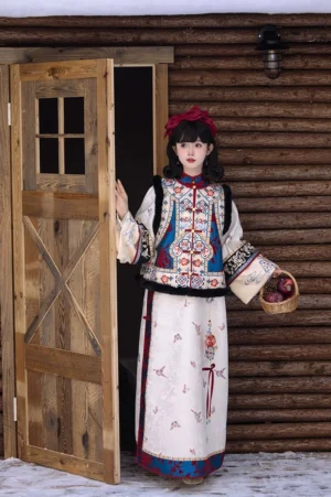 Full Snow White inspired Chinese New Year dress with embroidered vest and long ivory cheongsam at a wooden cabin doorway