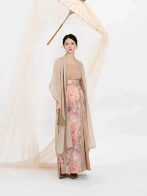 Song Dynasty Hanfu outfit with flowing beige beizi jacket and pastel floral pleated skirt shown in side front view