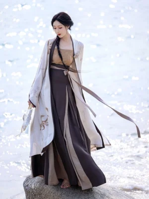Side view of Song Dynasty inspired Hanfu outfit showing long trailing waist ties, flowing beizi jacket, layered wrap skirt, and neutral earth-tone styling
