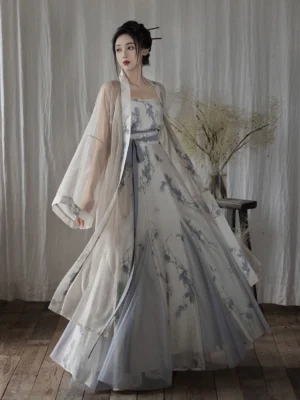 Full Song Dynasty Hanfu set in ivory and dusty blue with floral camisole, flowing long jacket, and pleated wrap skirt front view
