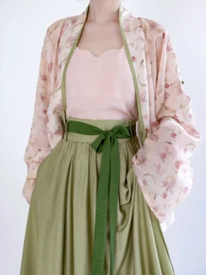 Close-up view of Song Dynasty Hanfu cardigan, sweetheart camisole neckline, green trim, waist sash, and lightweight breathable fabric texture