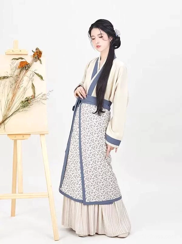 Song Dynasty modern Hanfu inner top and spiral skirt with beige cross-collar top, blue trim, floral skirt border, and pleated hem