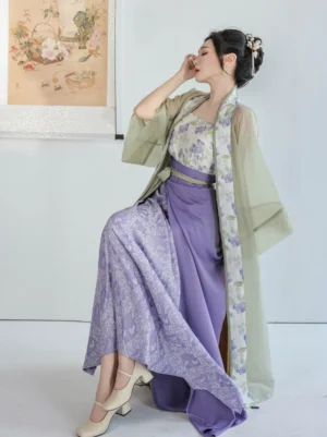 Three-piece Song Dynasty Hanfu beizi set in sage green and purple with floral camisole and spiral wrap skirt worn by model