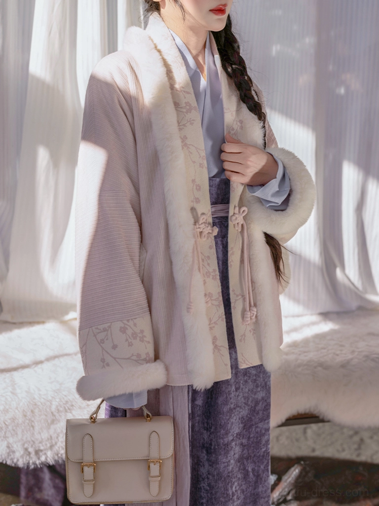 Close-up view of Song Dynasty hanfu winter coat with floral embroidered faux fur trim frog closures and warm wool blend fabric