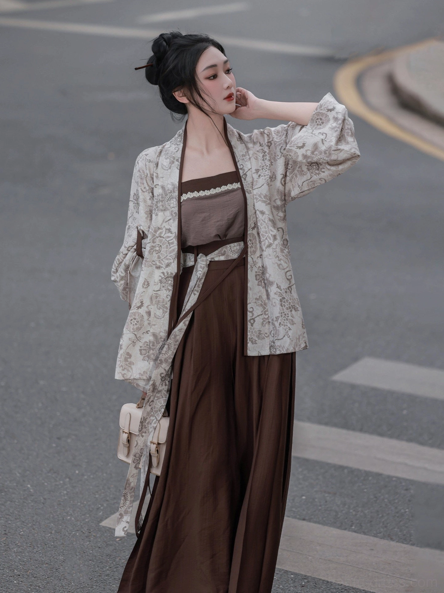 Side view of Song Dynasty inspired Hanfu camisole set with flowing coffee brown wide-leg pants and tie-front cardigan