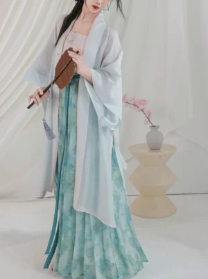 Song Dynasty modern hanfu full outfit front view featuring sheer cardigan pink camisole and watercolor cyan pleated wrap skirt