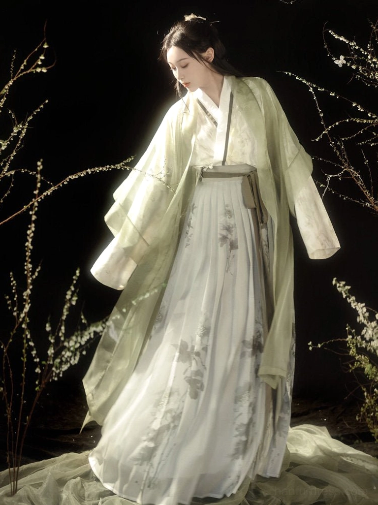 Three-quarter front view of a Song Dynasty modern Hanfu Beizi set with pale green sheer outer robe, ink floral pleated skirt, and plum blossom studio styling