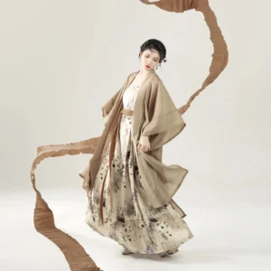 Song Dynasty modern hanfu full set with beige wide sleeve overcoat, ink wash printed maxi dress, and flowing brown waist sash shown in a three quarter studio view