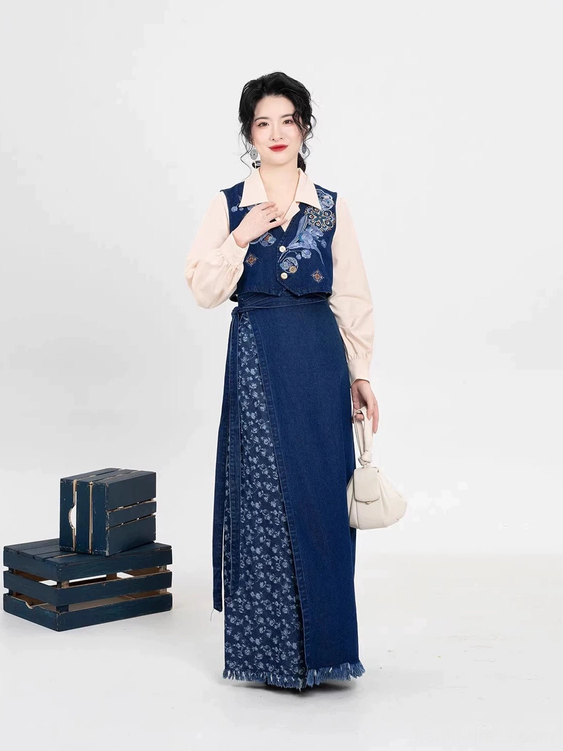 Modern Song Dynasty Hanfu three-piece set with ivory blouse embroidered navy majia vest and denim-style floral wrap skirt front view