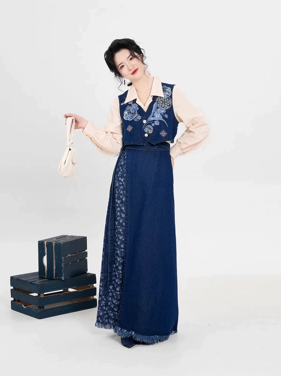 Modern Song Dynasty Hanfu set right side profile showing ivory collared blouse embroidered vest and floor-length wrap skirt