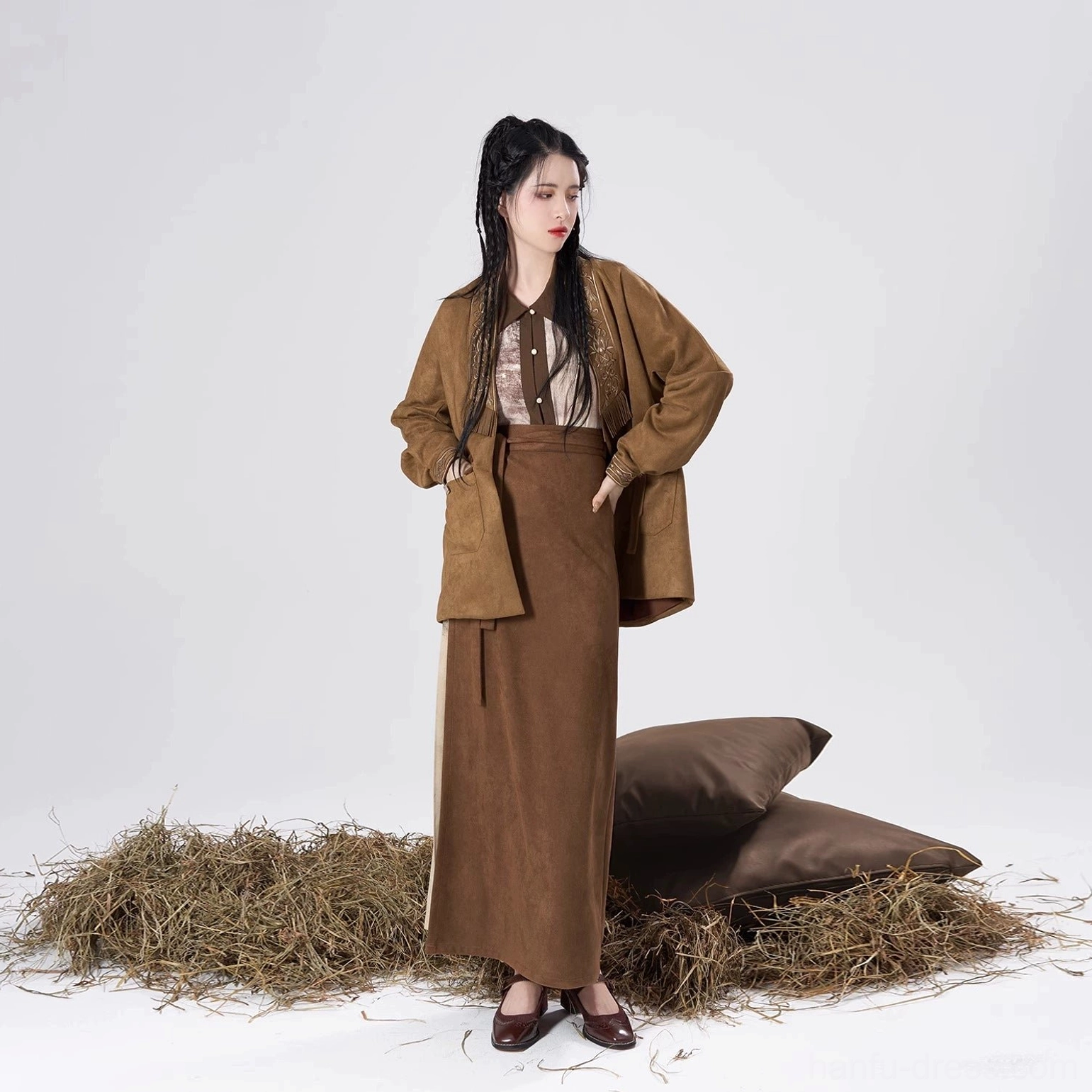 Front standing view of a Song Dynasty modern Hanfu set with a high-waisted two-tone skirt, loose brown coat, and coordinated long sleeve top