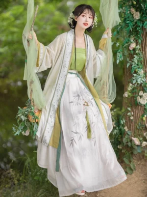 Song Dynasty qiyao ruqun hanfu complete set with ivory yellow beizi green camisole and bamboo print white skirt in waterside garden