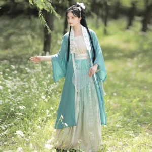 Cyan and off-white Song Dynasty qiyao ruqun hanfu set with flowing sheer beizi, pleated gradient skirt and embroidered trim, shown in a willow woodland