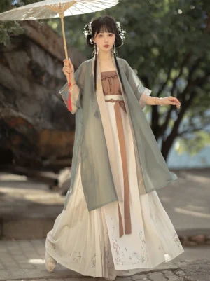 Song Dynasty Qiyao Ruqun Hanfu set with dusty blue sheer beizi, brown camisole, embroidered ivory skirt and waist sash front three-quarter view