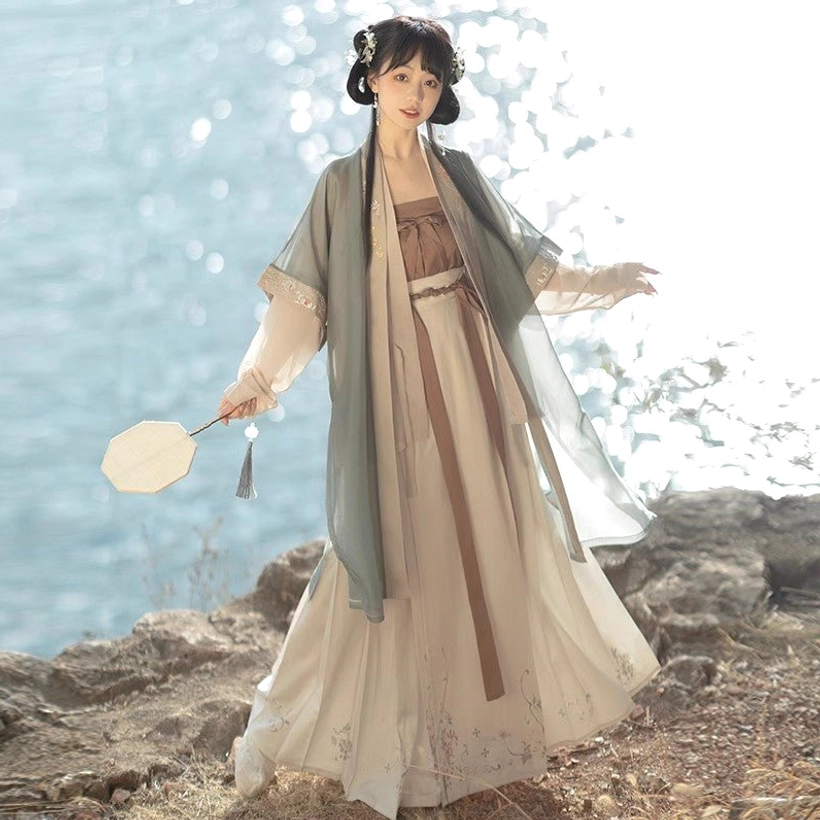Back side view of Song Dynasty Qiyao Ruqun Hanfu complete set with dusty blue sheer outer coat, ivory embroidered maxi skirt and brown sash