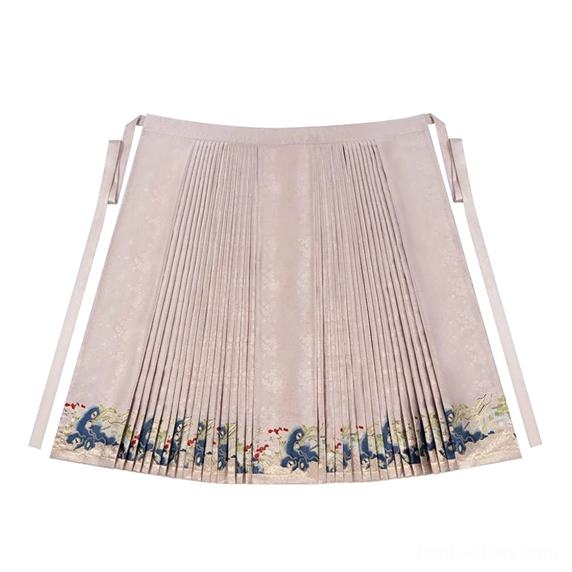 Flat lay of dusty pink Song Dynasty inspired mamianqun horse face skirt with vertical pleats and embroidered hem decoration