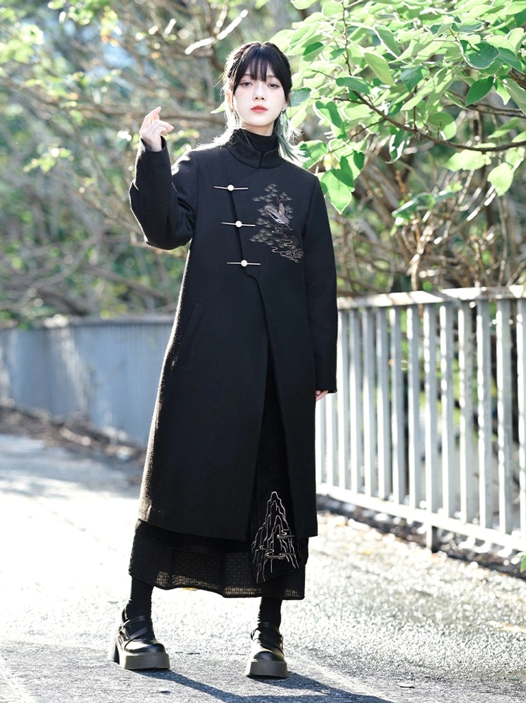 Full-body view of a Songhe pine crane embroidered long wool-blend Hanfu coat with high collar, side slit hem, and traditional toggle fasteners