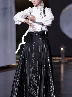 Close front view of white Chinese calligraphy stand collar Hanfu top and black pleated mamian skirt with leather waist belt styling