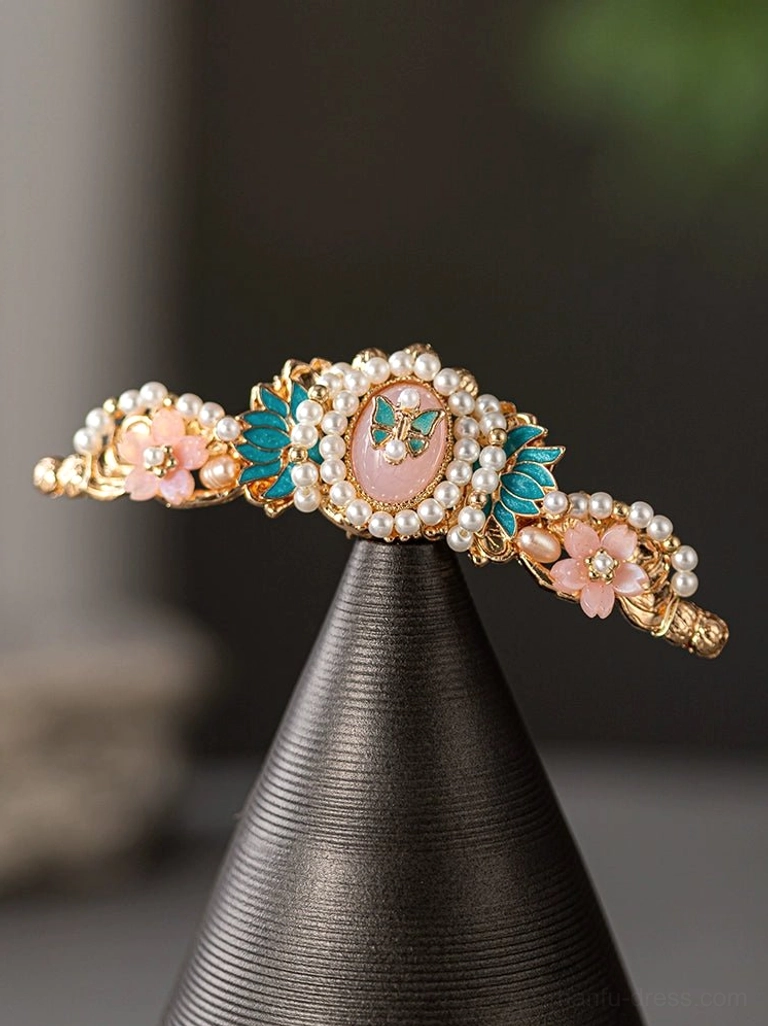 Spring Lane Hanfu floral hair crown close up with central pink stone, imitation pearls, pink blossoms and blue green enamel style leaves