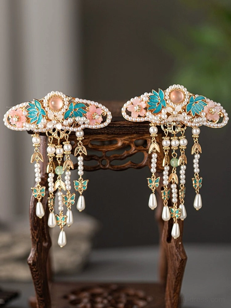 Spring Lane traditional Chinese Hanfu hair clips on wooden stand with layered tassels, pearl drops and butterfly pendants